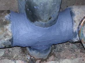 Sewage pipe sealed with Belzona 9611 and wrapped over with Belzona 1161 (Super UW-Metal)